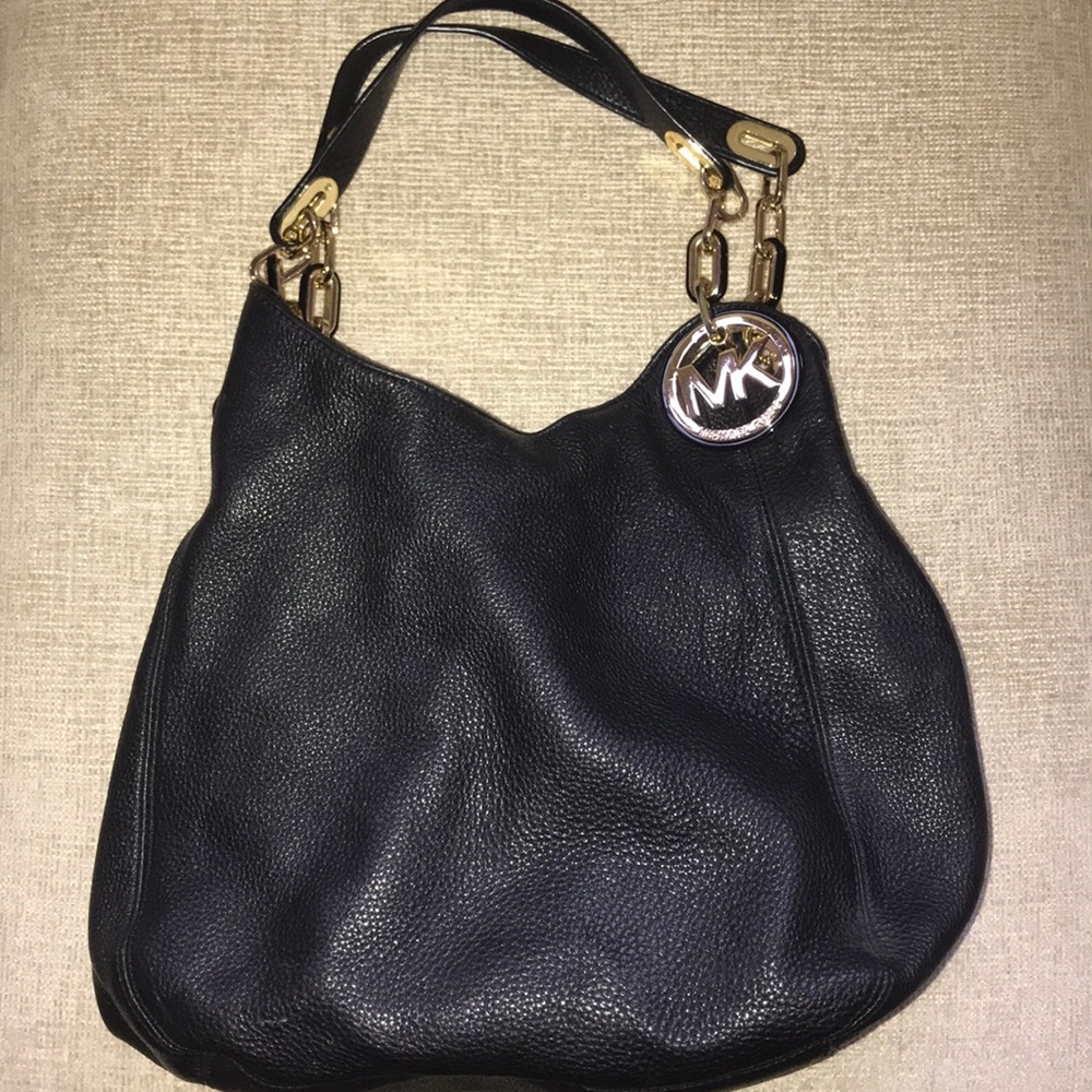Used once Michael Kors black&gold hobo bag purse